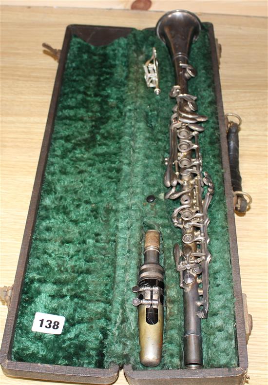 A Gladiator silver plated clarinet, cased